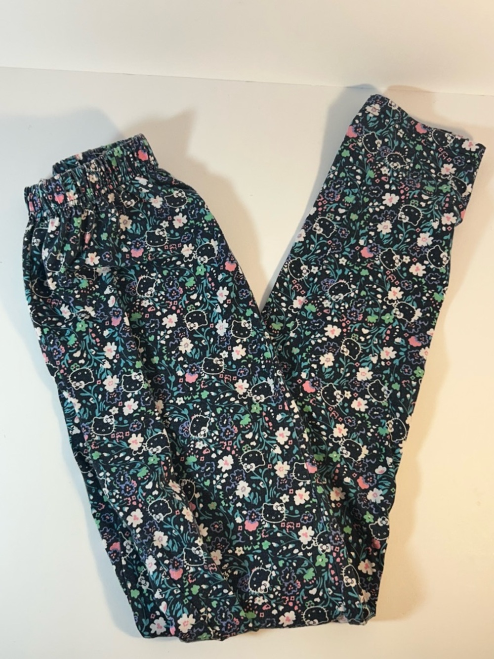 Hello Kitty by Sanrio girl’s leggings dark navy floral print size 12
